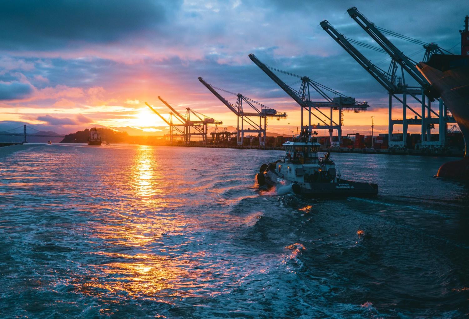 Offshore cranes at sunset